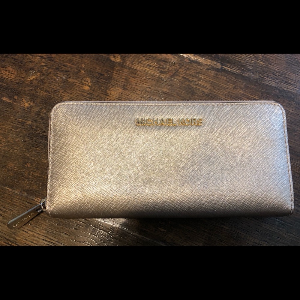 Michael Kors gold zip around wallet